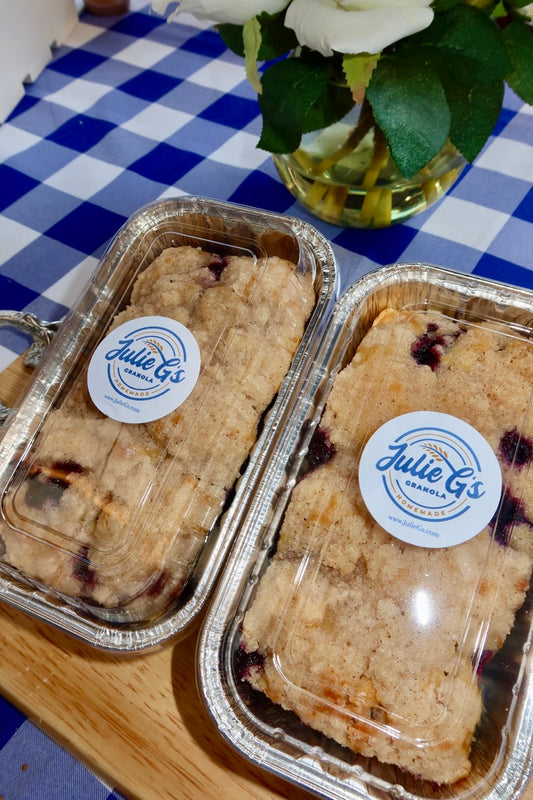 Two Julie G’s Blueberry Bliss white chocolate loaves in baking trays